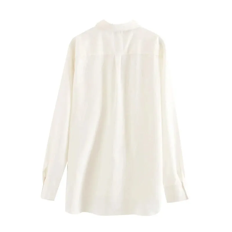 LOOSE FITTING ASYMMETRIC BLOUSE