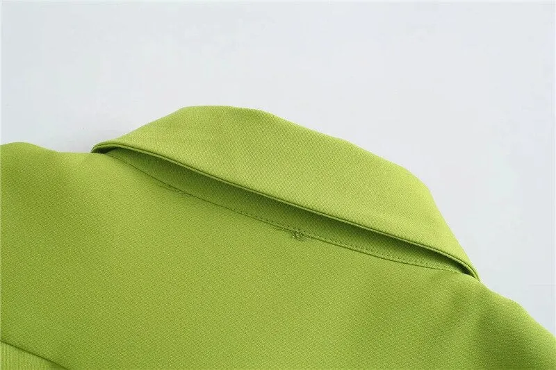 LOOSE FITTING ASYMMETRIC BLOUSE