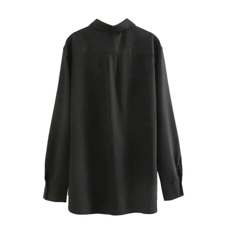 LOOSE FITTING ASYMMETRIC BLOUSE